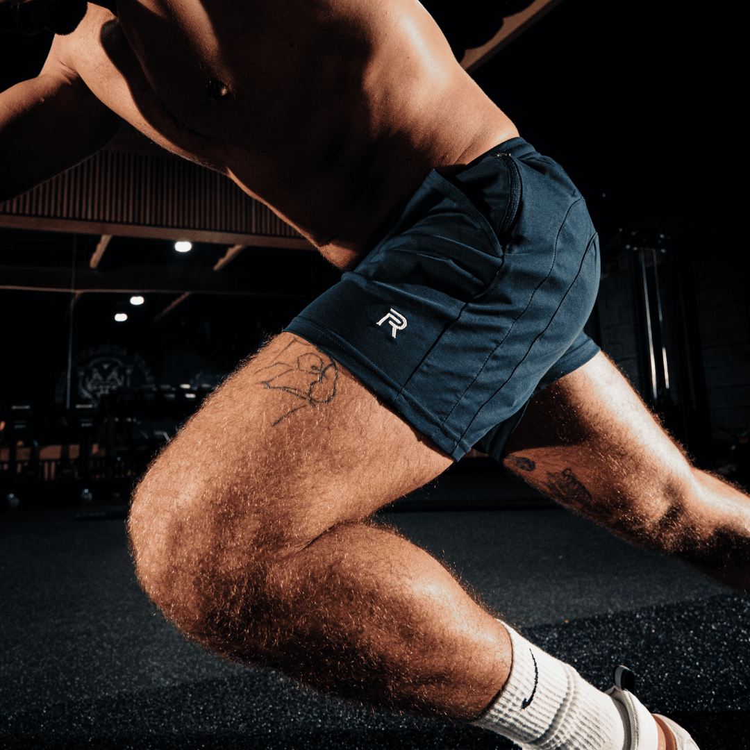 A single green leaf against a white background.