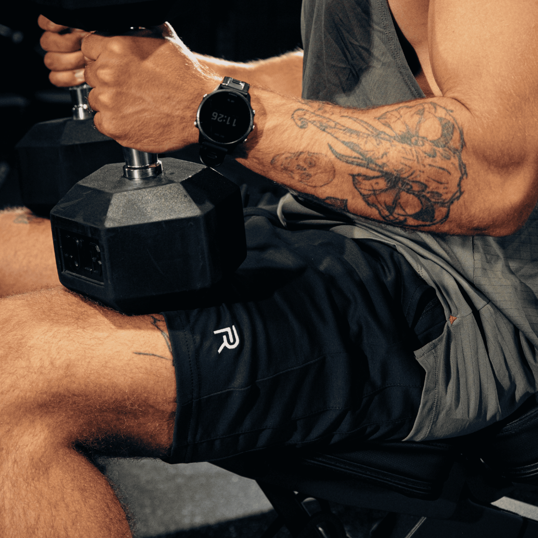 A single green leaf against a white background.
