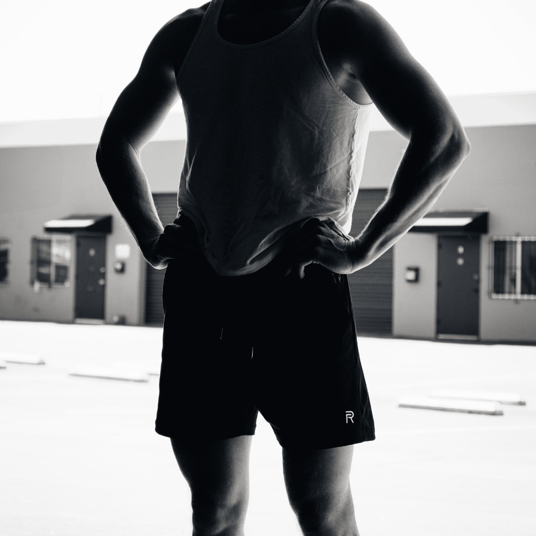 A single green leaf against a white background.