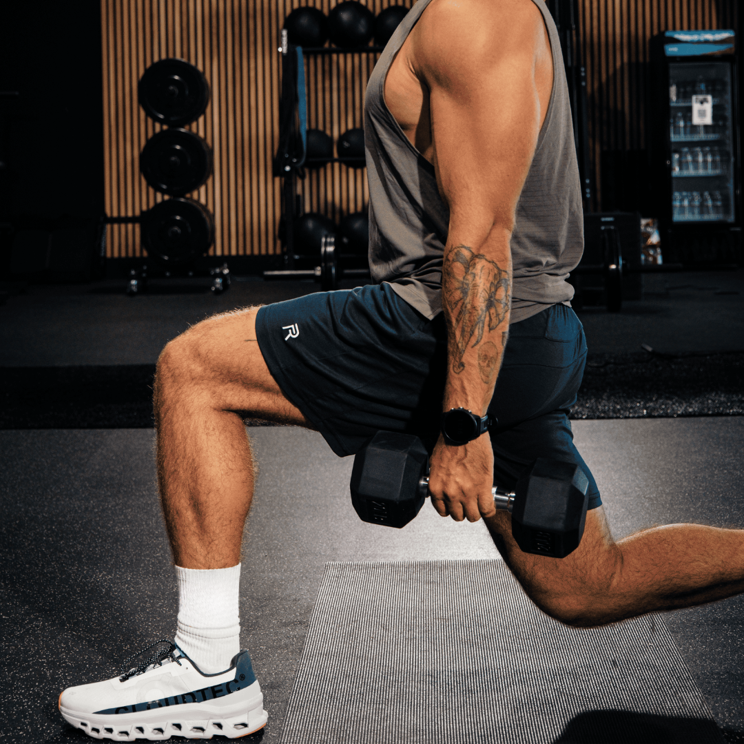 A single green leaf against a white background.