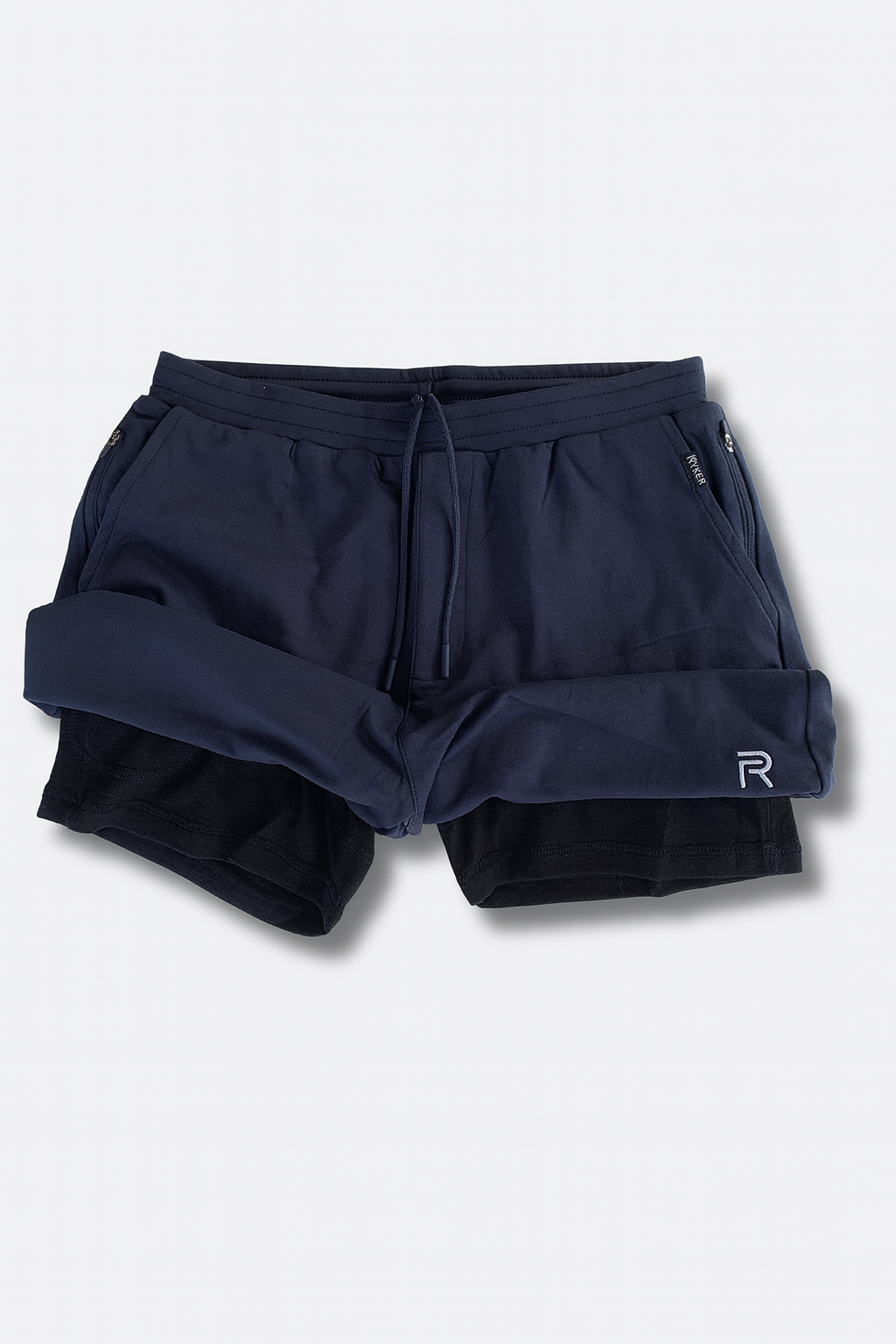 A single green leaf against a white background.