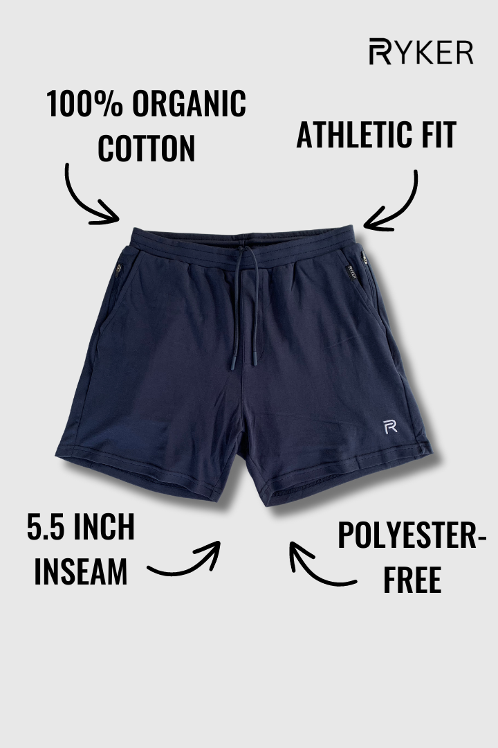 A single green leaf against a white background.