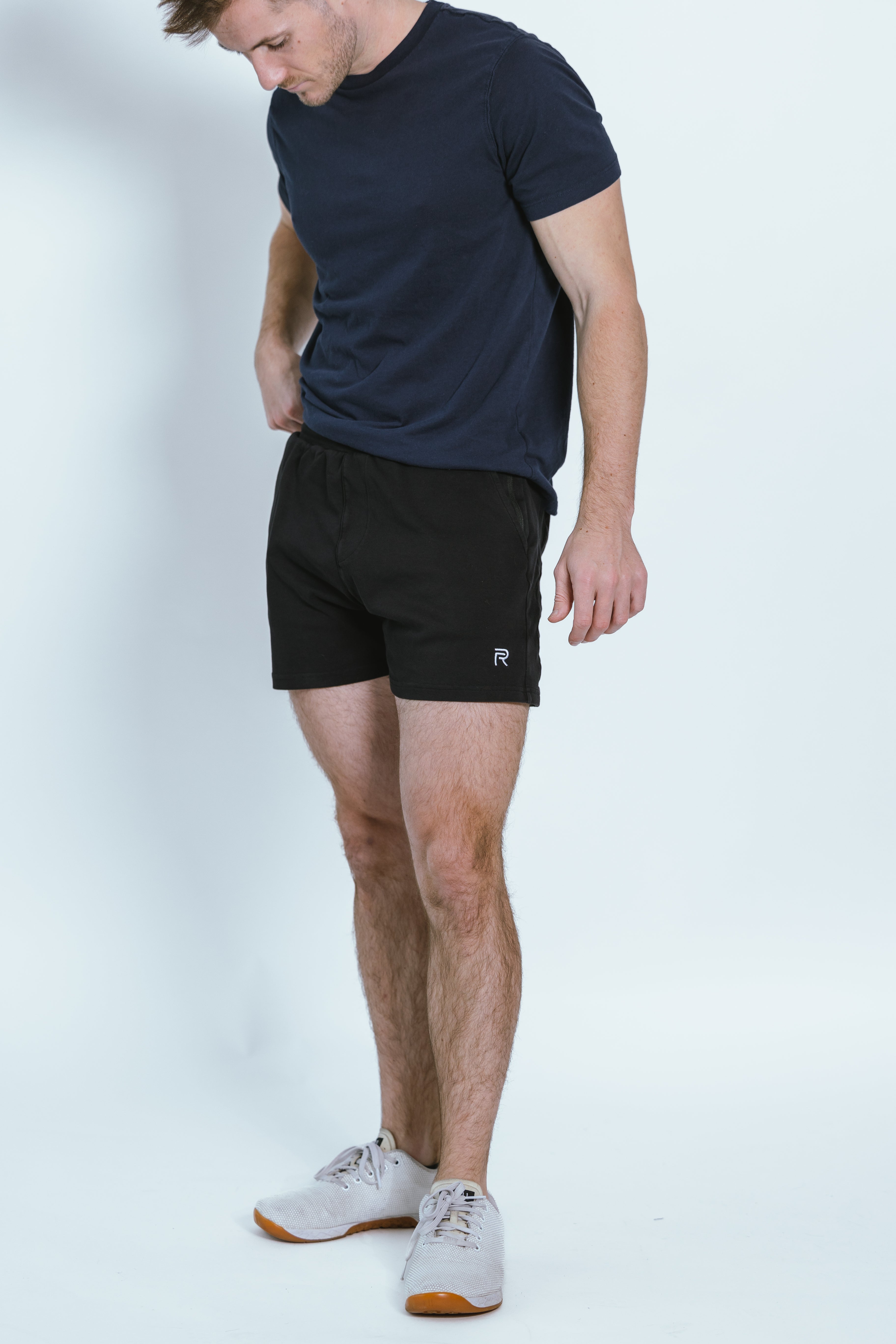 A single green leaf against a white background.