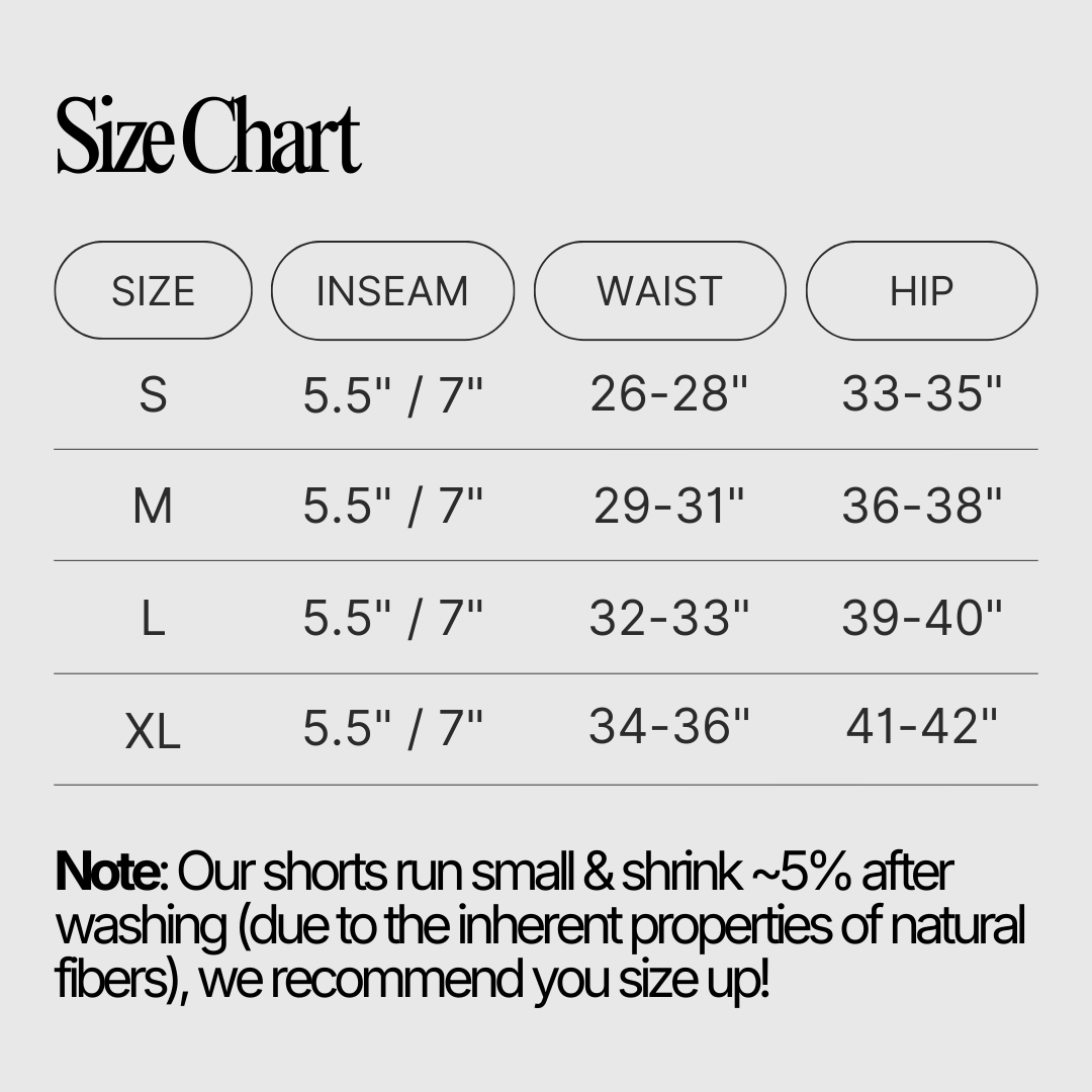 A single green leaf against a white background.